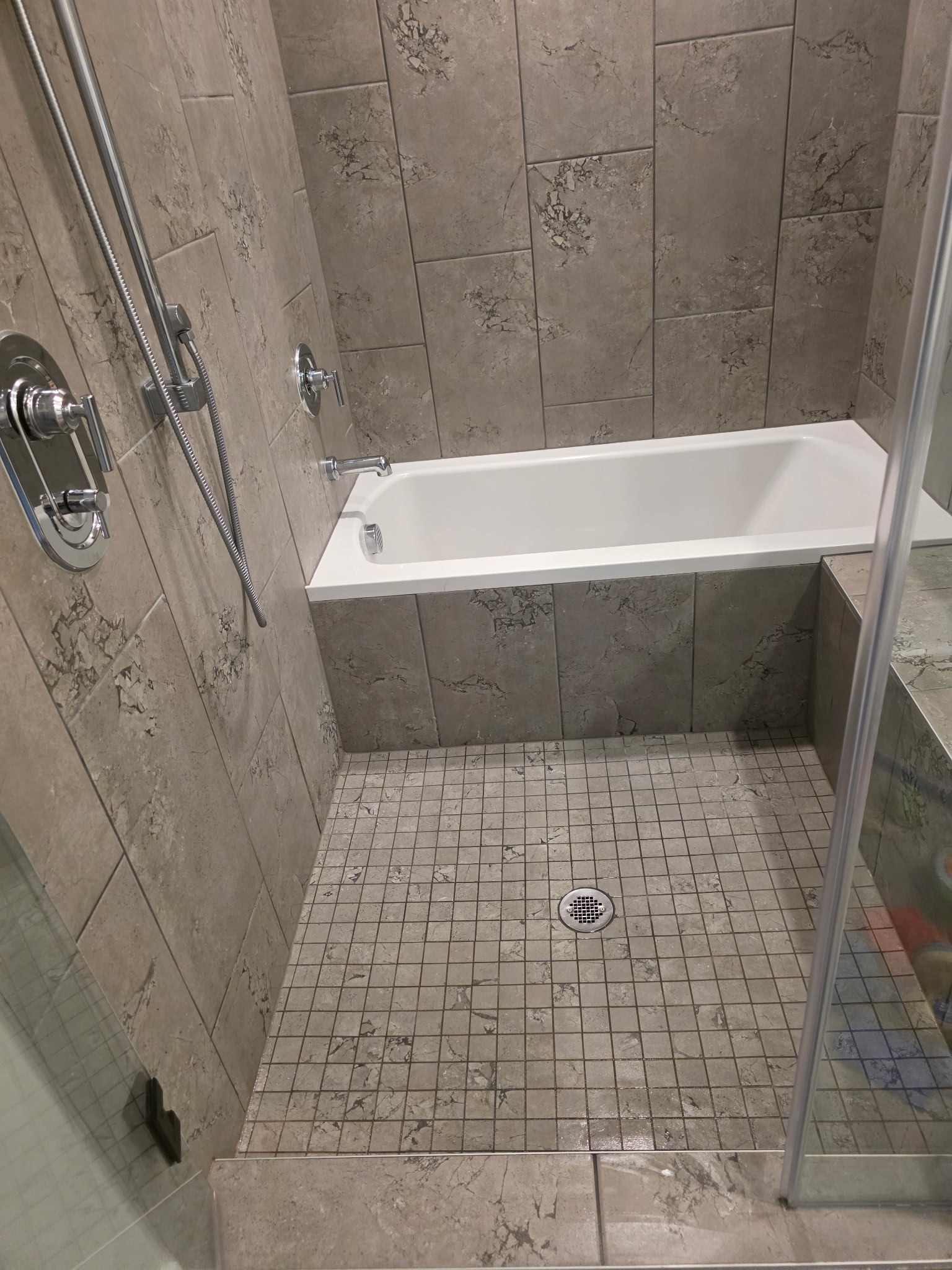 The same shower after a Coley Clean Co cleaning